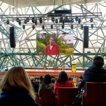 A photo of Canadian landscape architect Jane May Hutton speaking at the event