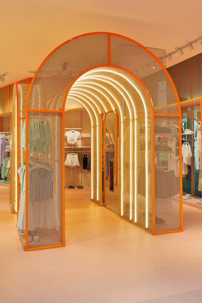 Orange entrance tunnel with strip lighting