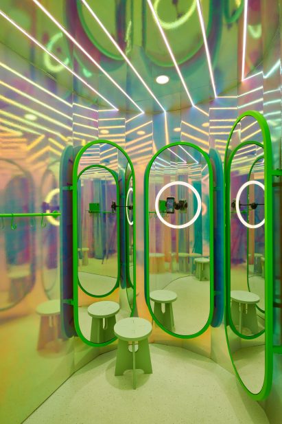 Green Mango Teen changing room with reflective walls and ceiling