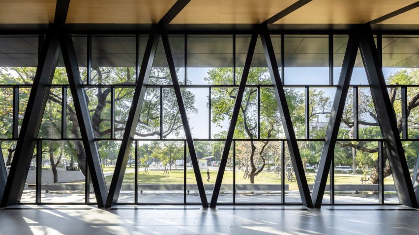 MAYU Architects updates library in Taiwan with glass-walled foyer and white cladding
