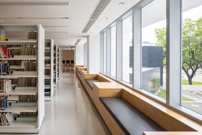 MAYU Architects updates library in Taiwan with glass-walled foyer and white cladding