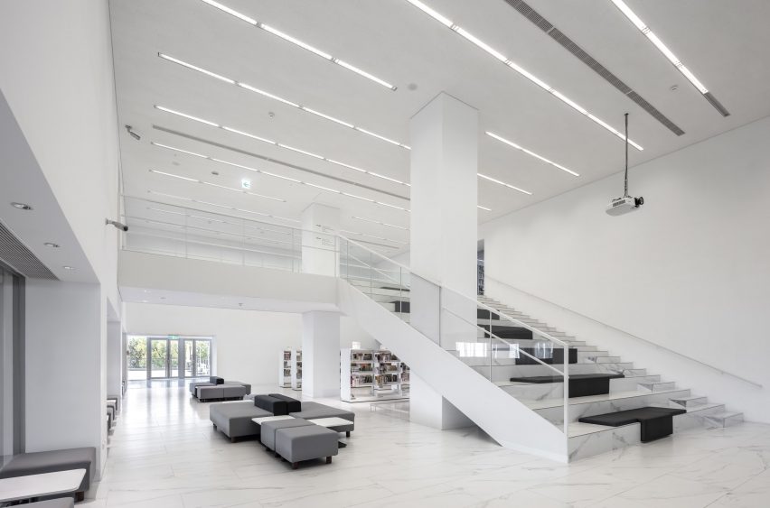 MAYU Architects updates library in Taiwan with glass-walled foyer and white cladding