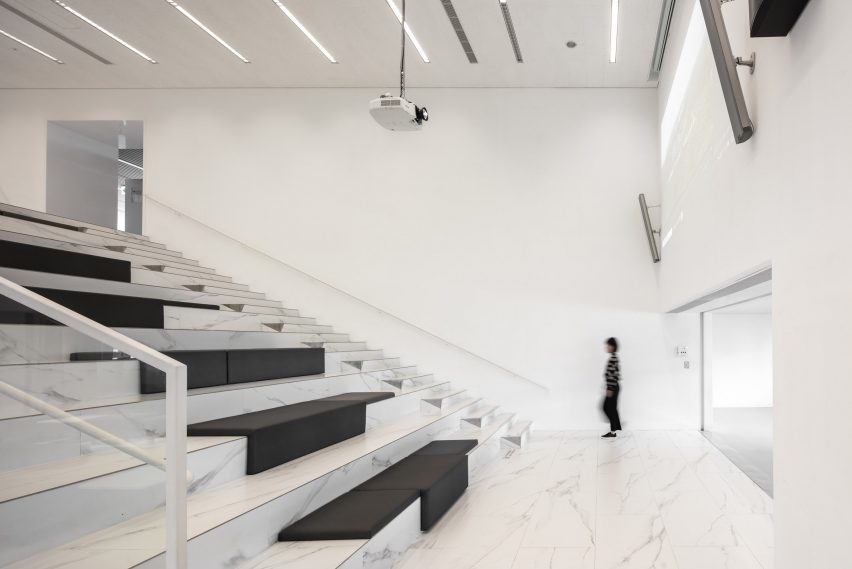 MAYU Architects updates library in Taiwan with glass-walled foyer and white cladding