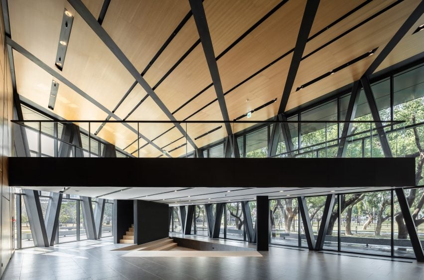 MAYU Architects updates library in Taiwan with glass-walled foyer and white cladding