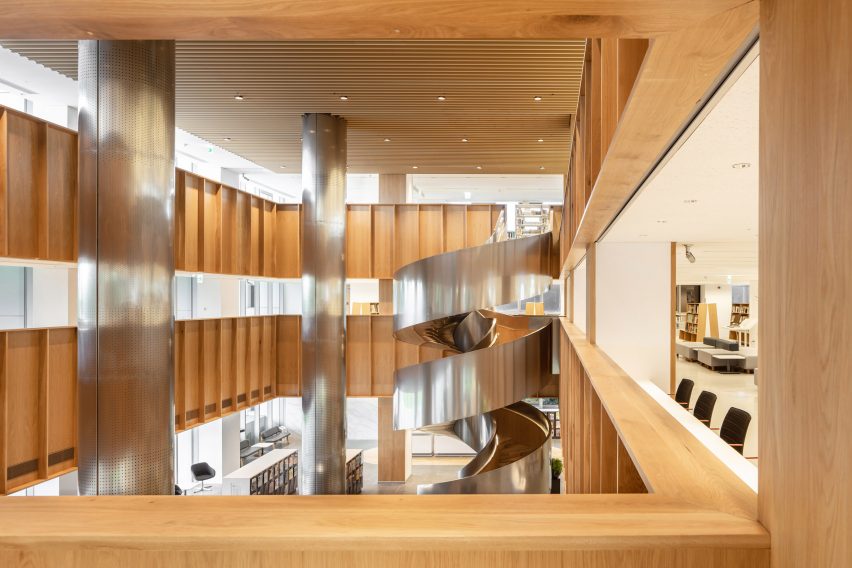 MAYU Architects updates library in Taiwan with glass-walled foyer and white cladding