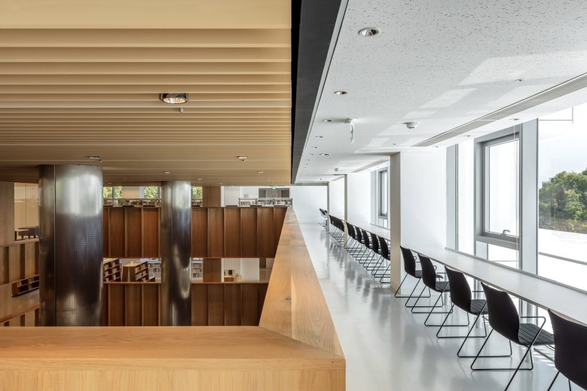 MAYU Architects updates library in Taiwan with glass-walled foyer and white cladding