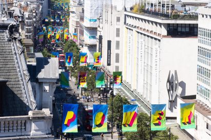 Elevated view of Morag Myerscough's flags for Clean Power on Oxford Street
