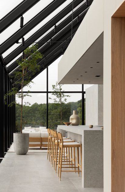 Norm Architects restaurant in Sweden containing bespoke concrete counter and oak furnishings