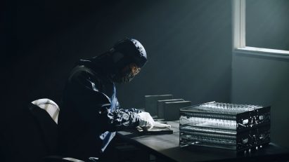 A photograph of an OPPO employee constructing the phone cover