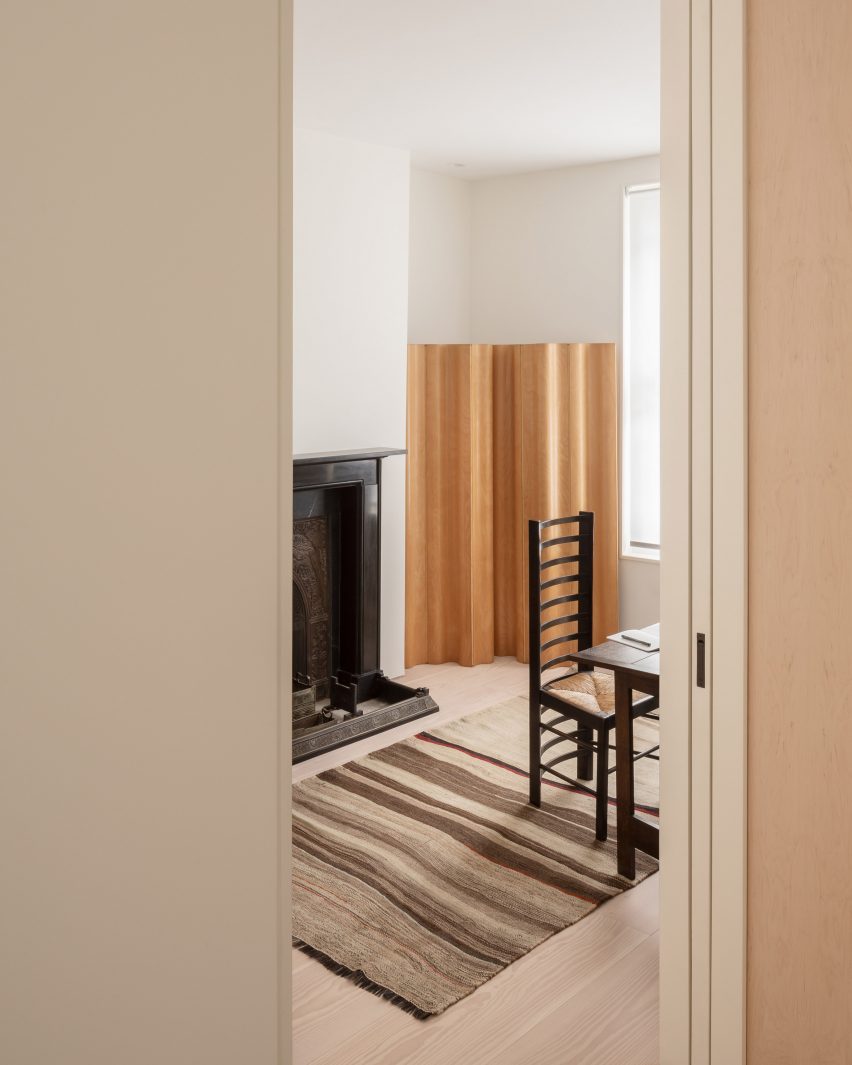 Red stone covers extension to London terrace by O’Sullivan Skoufoglou Architects