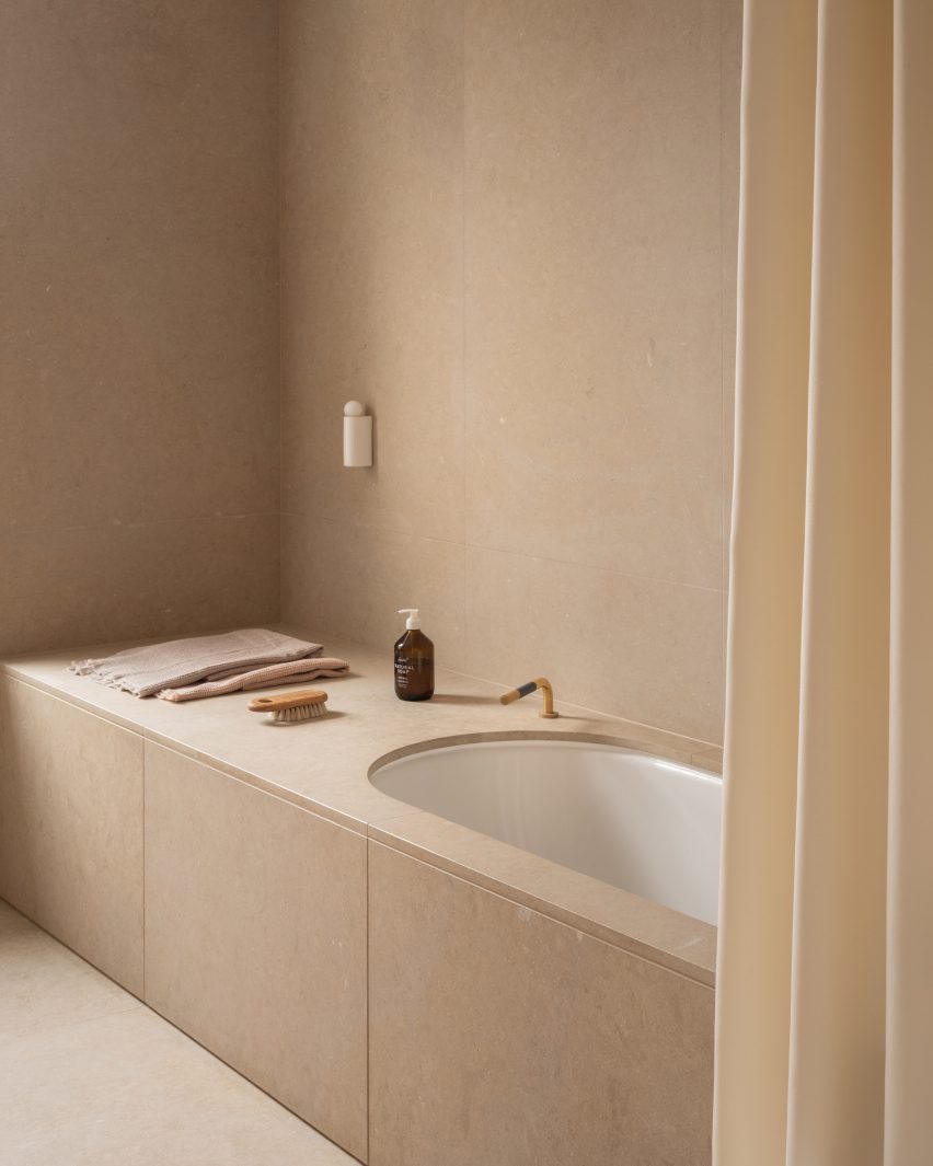 Red stone covers extension to London terrace by O’Sullivan Skoufoglou Architects