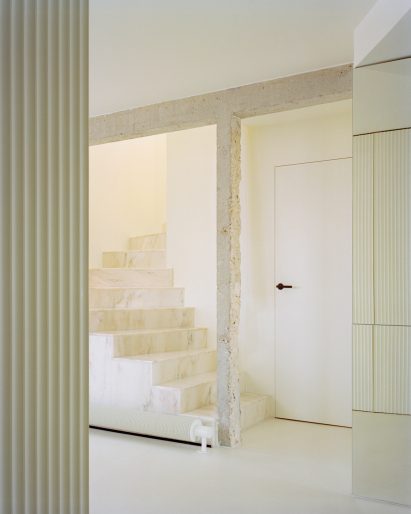 Interior image of a stone staircase at The Edge