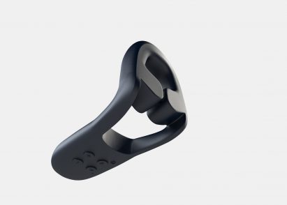 Bottom-up view of a Hand holding up Tanuto 2, a wearable vibrator for erectile dysfunction by MysteryVibe