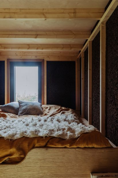 Bed loft in Tigín Tiny Home by Common Knowledge