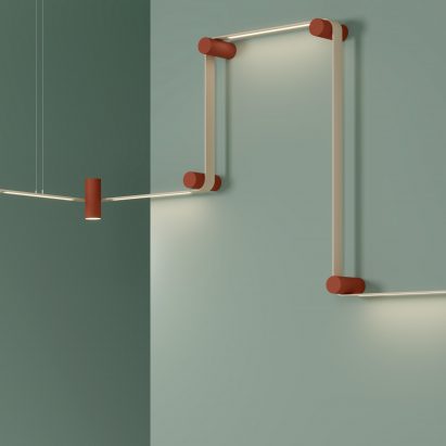 Nastro System modular lighting on a teal wall