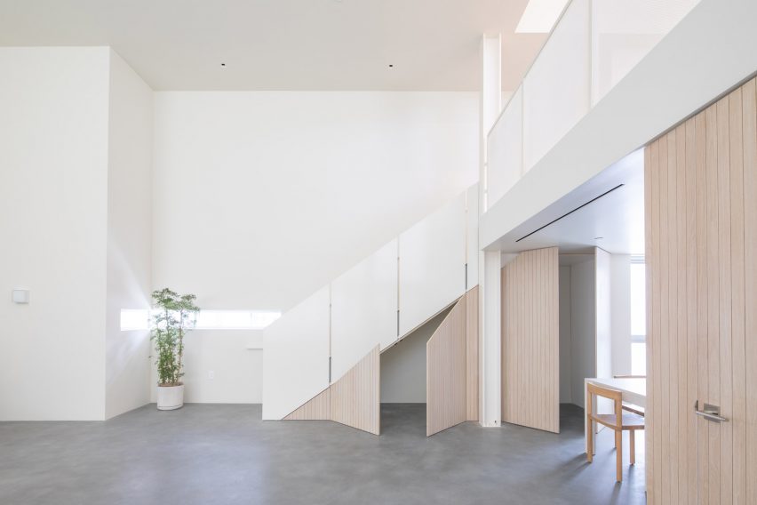 Stairway with concealed doors underneath