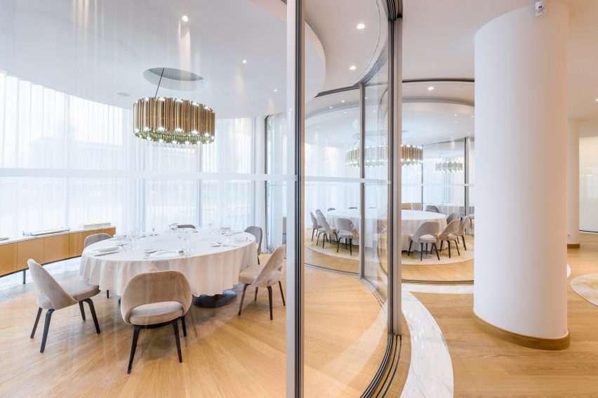 Vitrosca Curved sliding doors sectioning off glazed VIP rooms