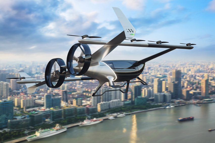 A car with propellers flying over a city