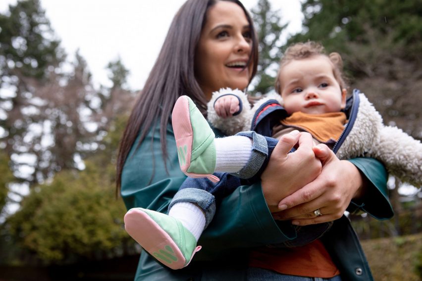 A mother and baby wearing Woolybubs shoes