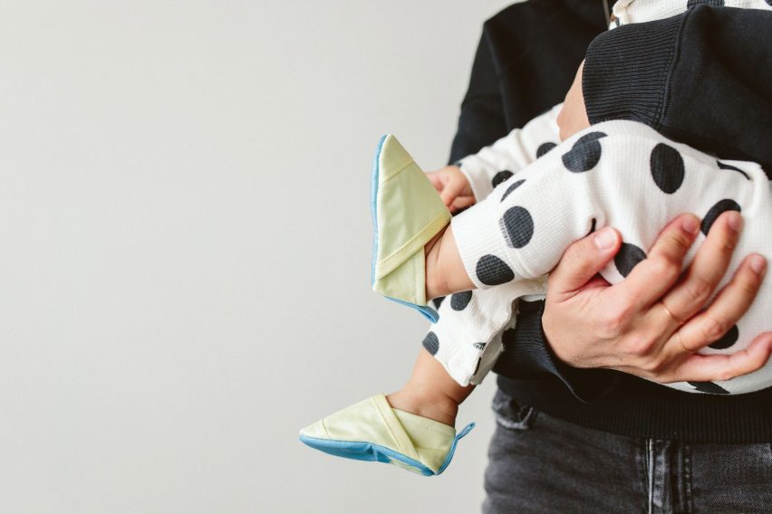 A mother holding a baby