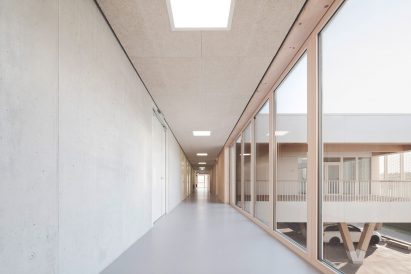 Windows surrounding platforms with timber frames in fire station