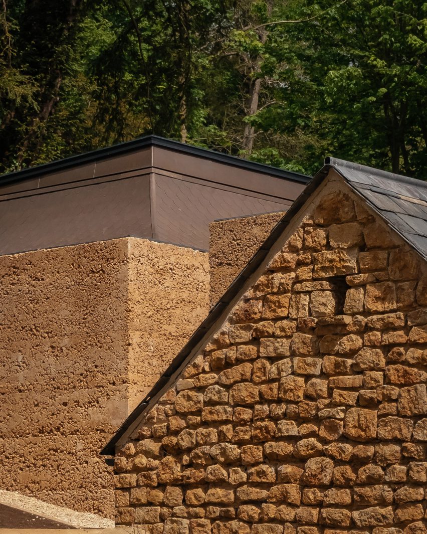 Rammed-earth exterior of Invisible Studio's yoga studio at The Newt in Somerset