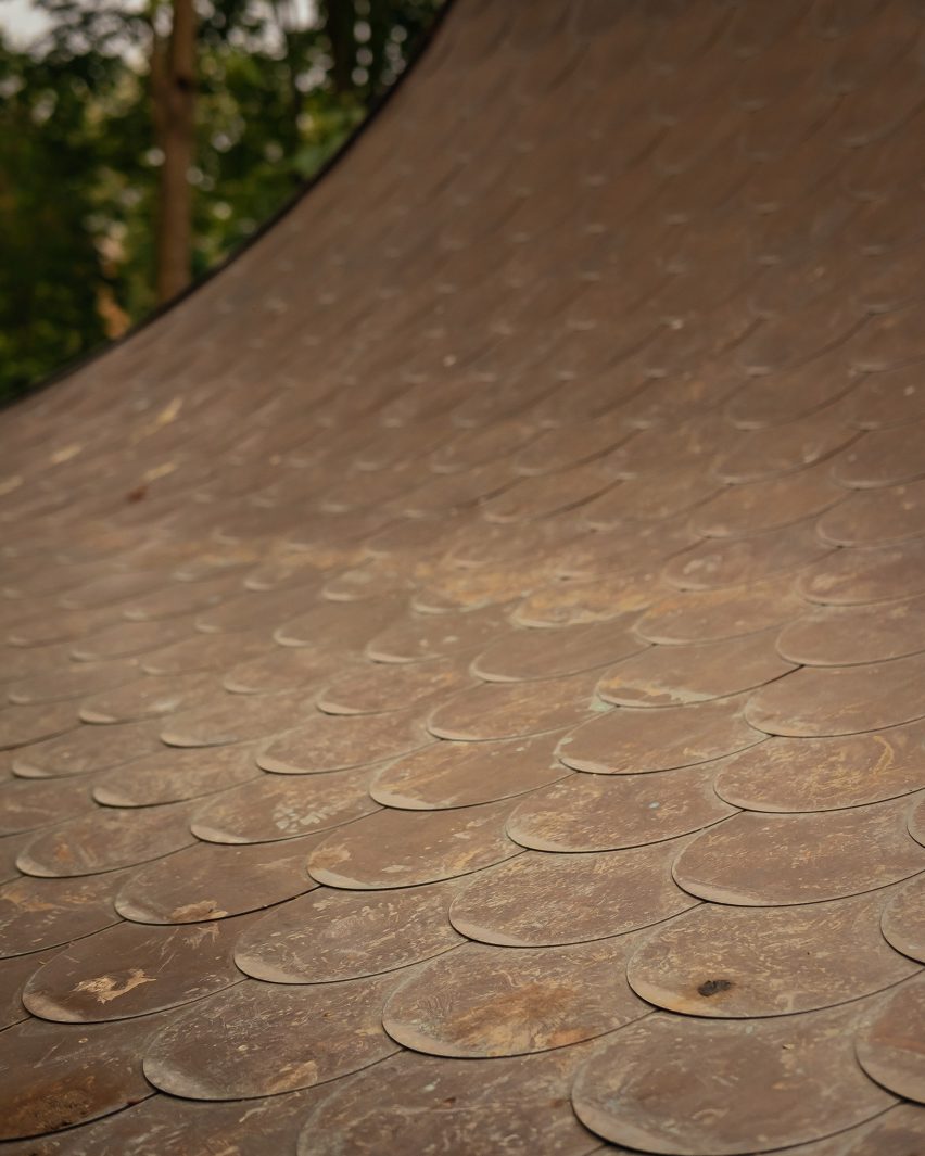 Curved roof with copper tiles
