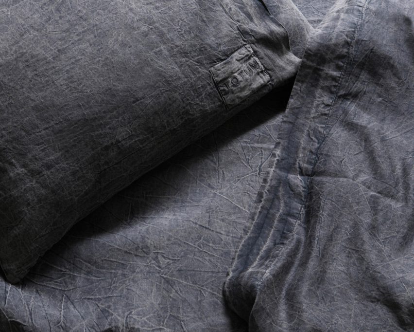 Photograph showing charcoal-coloured bedding
