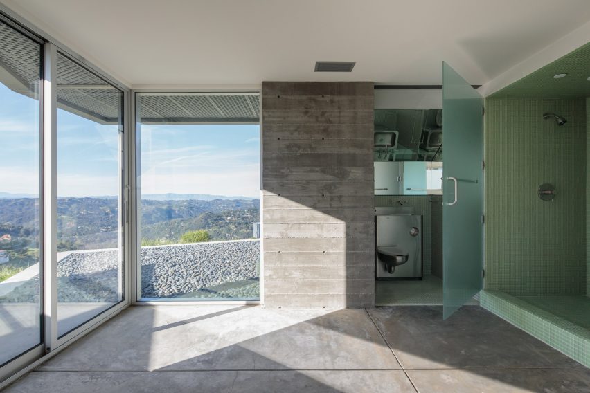 A stone interior of a house by Deegan Day Design