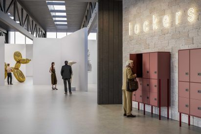 A photograph of people in a gallery space