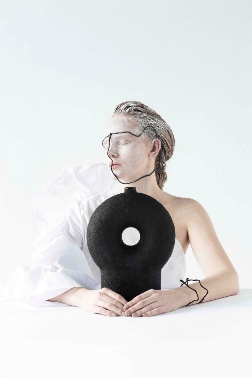 Woman holding ceramic design