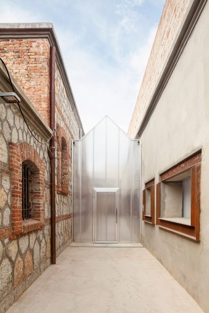 Photo of brick, concrete and glass walls