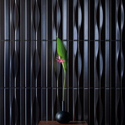 INAX tiles with a botanical arrangement in front of them