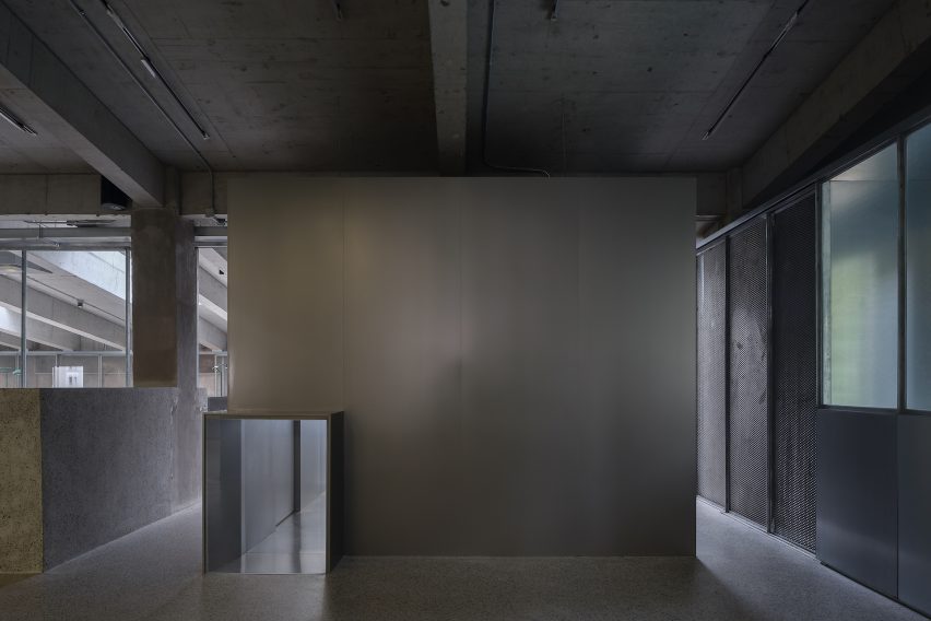 Stainless steel forms the meeting room at Red Plus studio by Neri&Hu