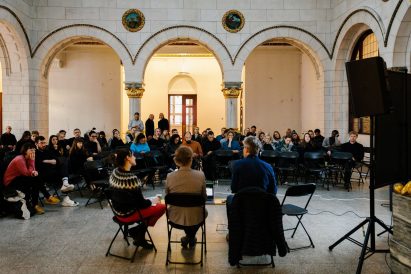 People watching a speaking event