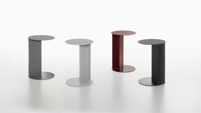 Photograph showing side tables positioned on a white backdrop