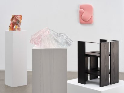A number of objects on display in a gallery