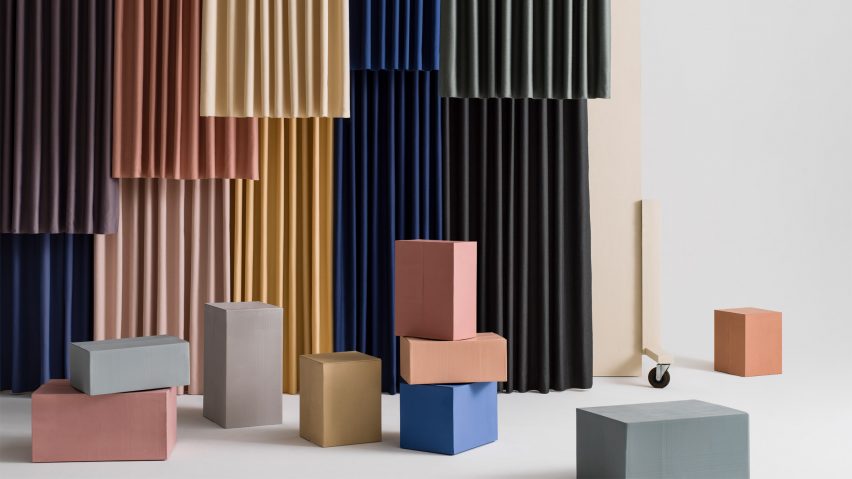 Different coloured Billow fabric hanging in a showroom space