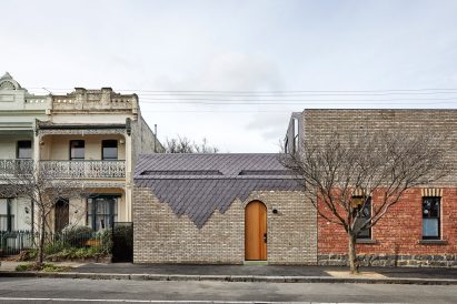 Tile pattern on facade of extension to Victorian brick terrace