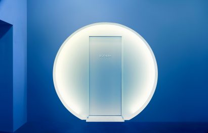 Biotherm concept store in Monaco has blue interiors with science lab-inspired details