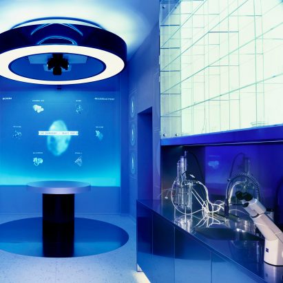 Biotherm concept store in Monaco has blue interiors with science lab-inspired details