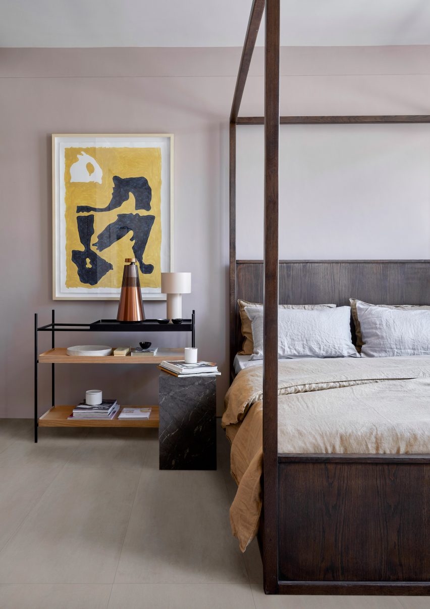 Photograph showing grey-floored bedroom