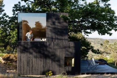 Black exterior of Chestnut House by João Mendes Ribeiro