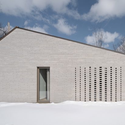Grey-brick clad single-family home Montreal