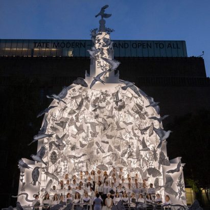 An illuminated dome with paper decorations