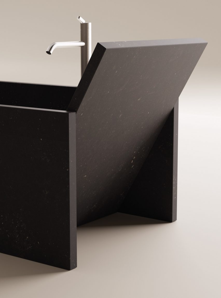 Photograph showing detail of black marble bathtub