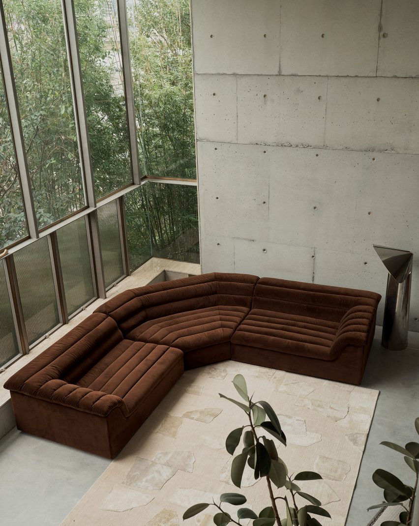 Float sofa by Sarah Ellison in a concrete interior