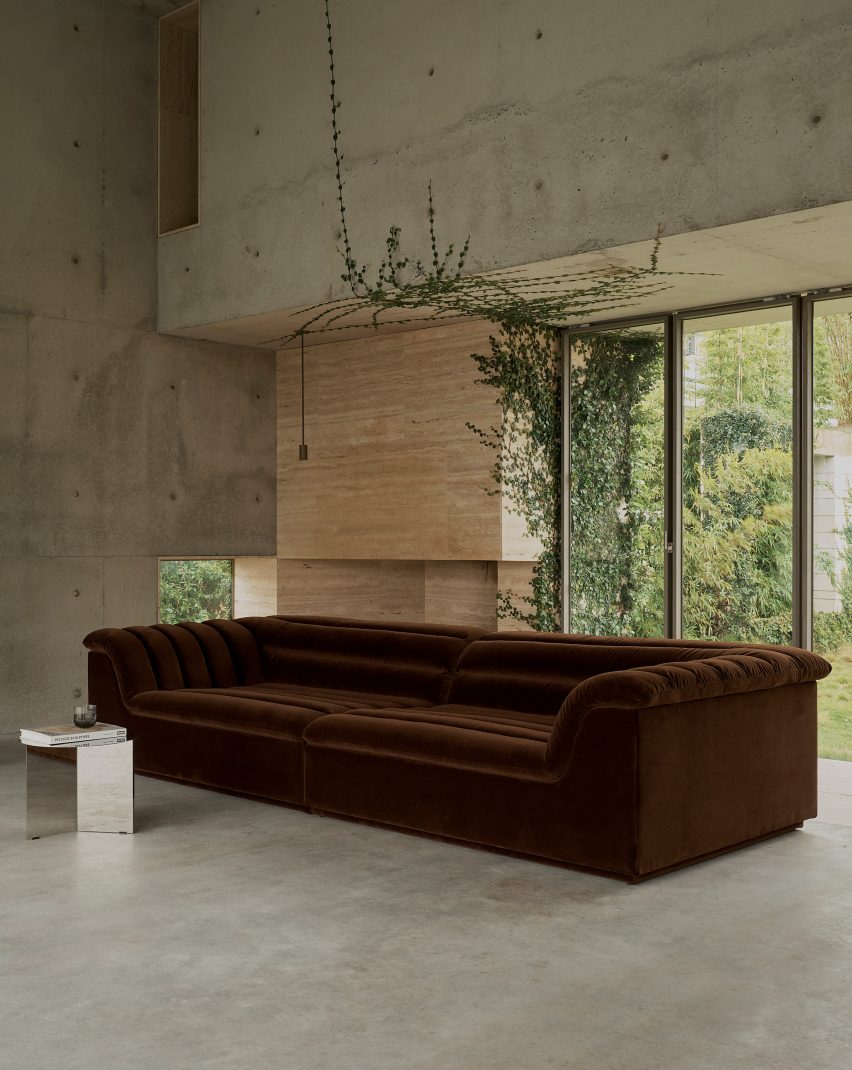 Float sofa by Sarah Ellison in a concrete interior