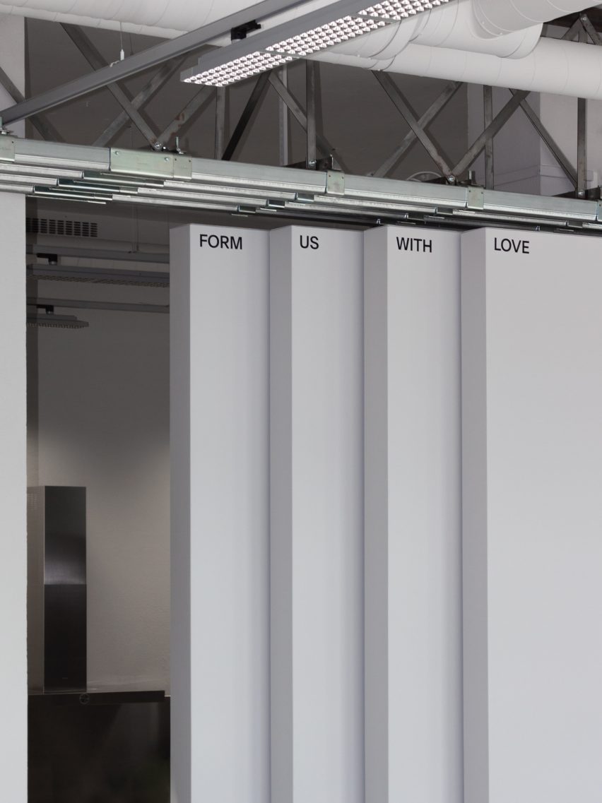 Floor-to-ceiling hangar doors in design studio