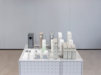 Plastic containers showcased on steel cabinet
